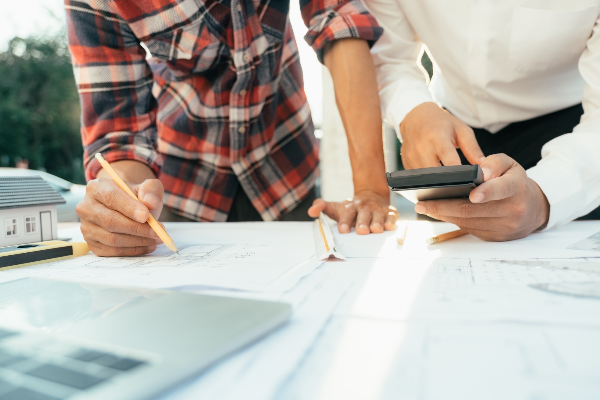 Engineer and architect working with new project.